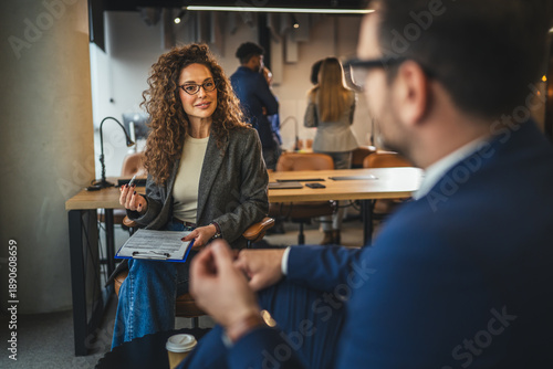Fotografía Businesswoman conducting a meeting or interview in modern office