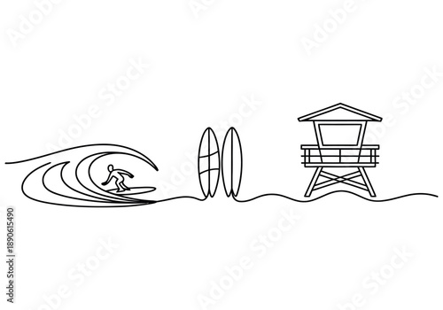 A surfer rides a wave near a lifeguard tower with a surfboard.