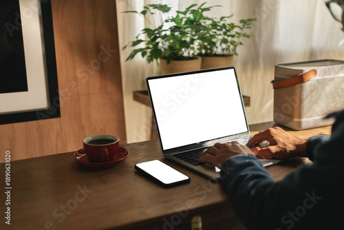 Wallpaper Mural computer screen,mobile phone blank mockup.work using laptop texting mobile.white background for advertising,contact business search information on desk in cafe.marketing,design Torontodigital.ca