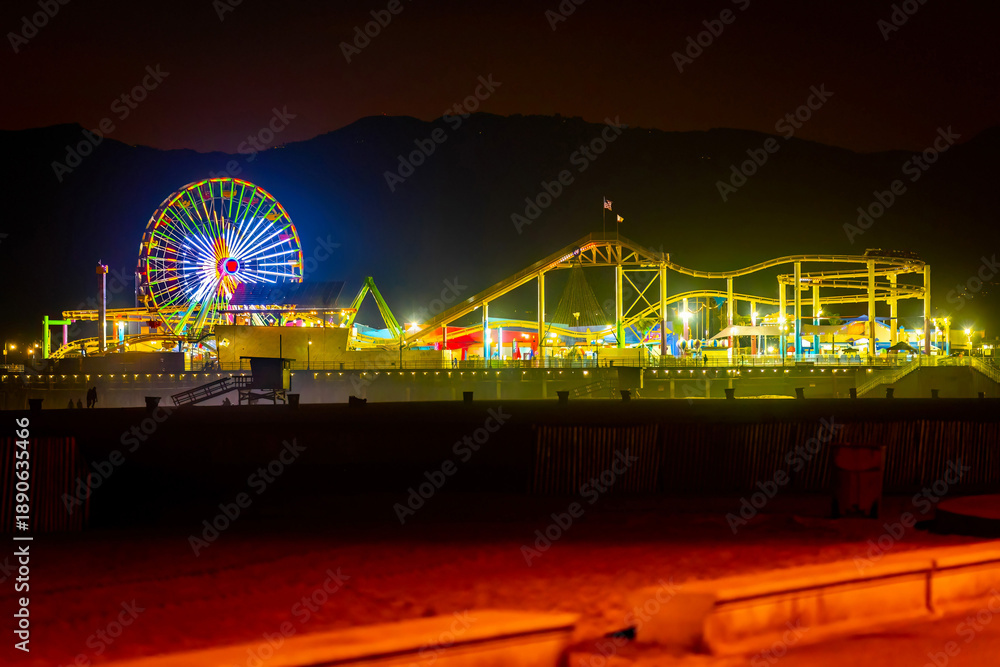 Obraz premium Pacific Park illuminated at night on Santa Monica Pier