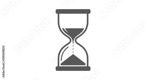 Classic hourglass with sand flowing through the narrow neck.