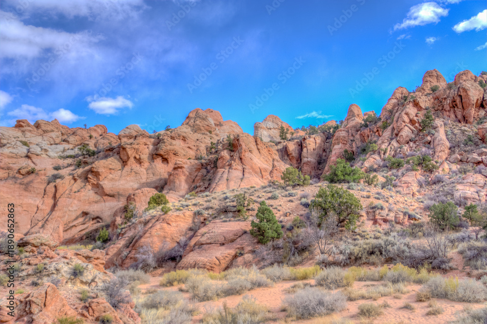 Fototapeta premium A rocky mountain range with a clear blue sky