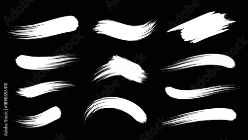 Dynamic collection of white paint brush strokes and artistic textures.
