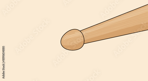 Close up of a wooden drumstick tip on a plain background.