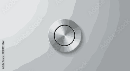 Close up of a metallic button with concentric circles.