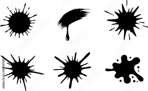 Collection of black ink splatters and drops on a white background