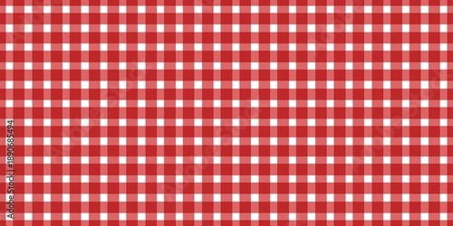Red and white gingham pattern background. Classic checkered picnic tablecloth texture. Seamless fabric design for kitchen, food, and summer themes.