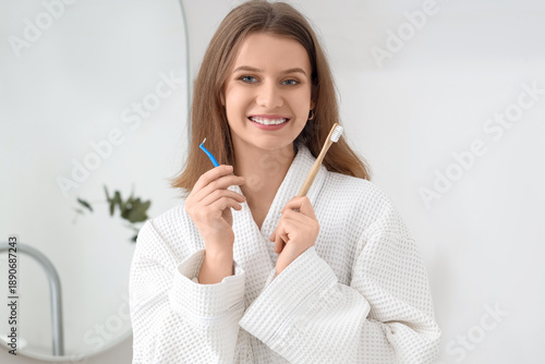 Smiling young woman with de...