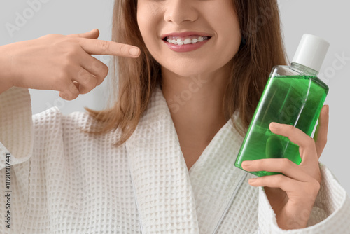 Smiling young woman with de...
