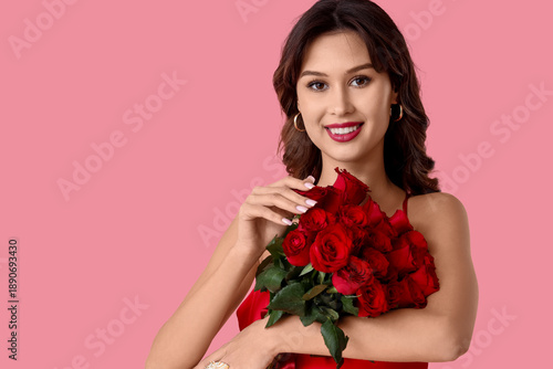 Happy young woman with bouq...