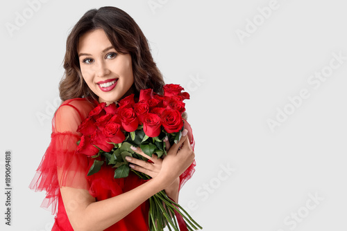 Smiling young woman with bo...