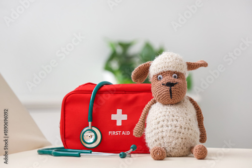 Toy sheep with first aid ki...
