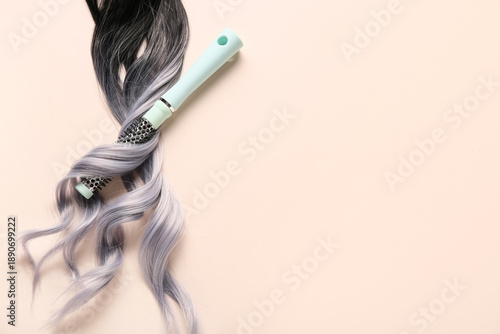 Curly grey hair strand with...