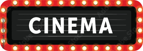 Vintage cinema marquee sign with bright lights and bold lettering at a classic movie theater entrance
