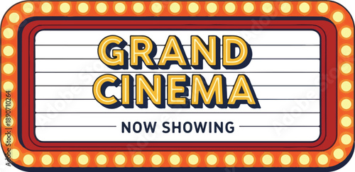 Vintage cinema sign displaying grand cinema now showing with ornate lights at night