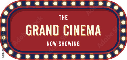 Vintage Cinema Sign with Bright Lights and Bold Lettering at Nighttime Entertainment Venue