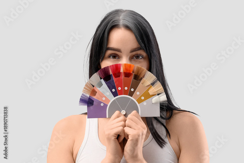 Young woman with graying ha...