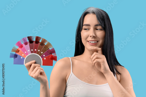Thoughtful young woman with...
