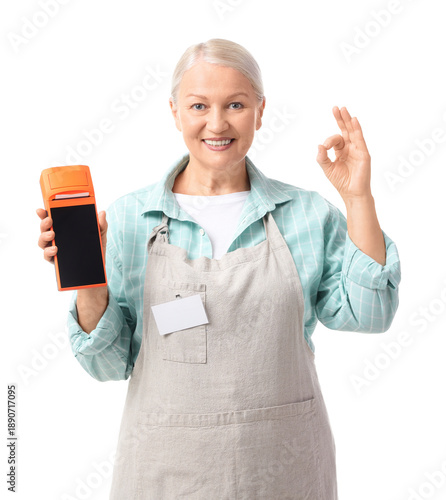 Mature female cashier with ...