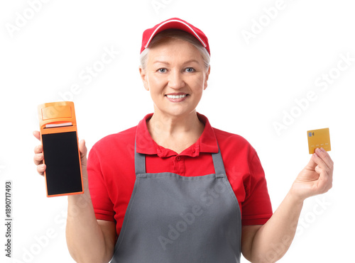 Mature female cashier with ...