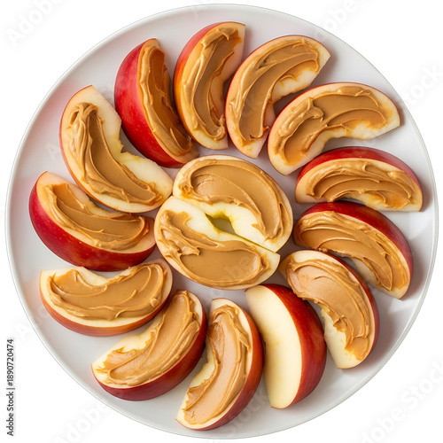 Red Apple Slices with Creamy Peanut Butter on White Plate