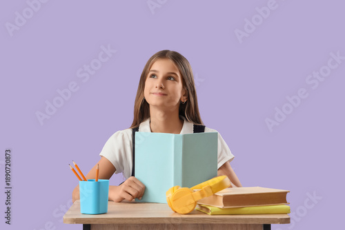 Dreamy teenage schoolgirl w...