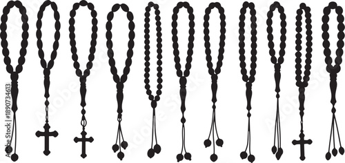 Collection of black rosary beads with crucifixes and tassels