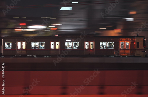 Tokyo,Japan - January 26, 2026: Panning of a commuter train at dawn
