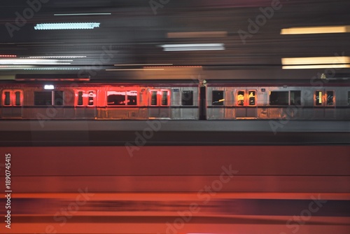 Tokyo,Japan - January 26, 2026: Panning of a commuter train at dawn

