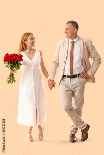 Happy mature couple with bo...