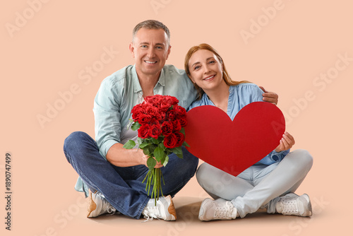 Happy mature couple with bo...