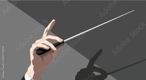 A Hand Holding a Conductor's Baton, Ready to Lead an Orchestra with a Shadow Cast on a Gray Background