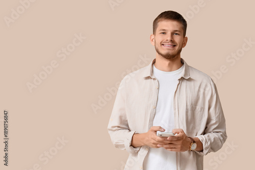 Handsome young stylish happ...