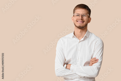 Handsome young happy busine...