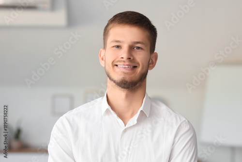 Handsome young happy busine...