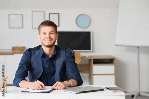 Handsome young happy busine...