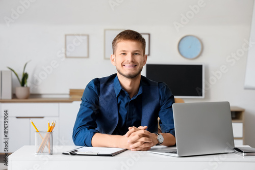 Handsome young happy busine...