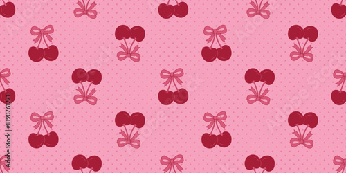 Seamless pattern of cherries with pink bows on a pink polka dot background, perfect for Valentine's Day decoration.