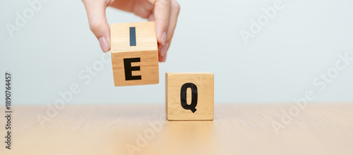 Tableau sur toile hand change wooden block from IQ to EQ, balance between intelligence quotient an