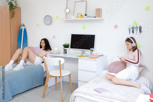 Female students resting on ...