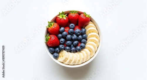 Fresh fruit bowl with strawberries blueberries and bananas