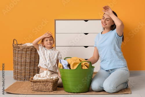 Tired mother and daughter d...