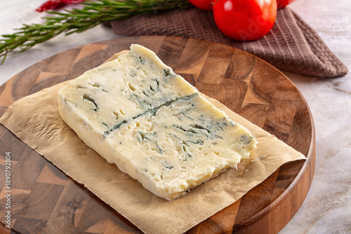 Tasty Italian gorgonzola cheese over board © Andrei Starostin