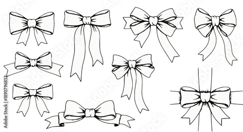 A single, clean metal whisk with a comfortable black handle, isolated on a bright white backdrop, symbolizing kitchen essentials.