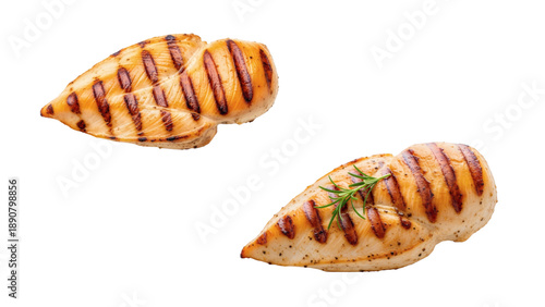 Wallpaper Mural Two grilled chicken breast fillets, one with rosemary, isolated against a transparent black background, for culinary uses Torontodigital.ca
