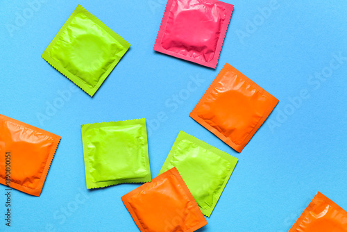 Set of different condoms on...