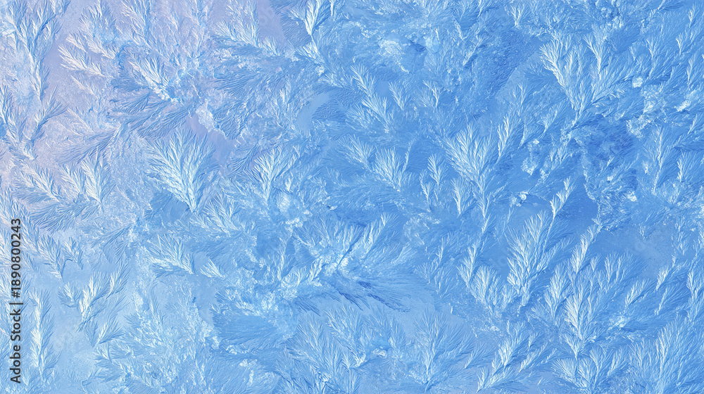 Obraz premium Close-up of a frosty ice surface. The intricate patterns and textures create an abstract and beautiful display.