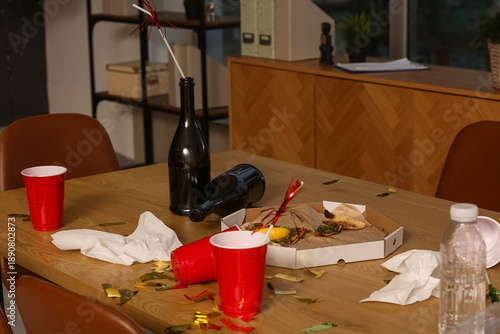 Cups with empty bottles, pi...