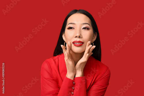 Beautiful Asian woman with ...