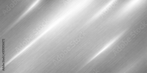 Shiny brushed metal plate texture featuring a polished silver stainless steel surface with a smooth industrial grey metallic pattern and titanium reflections for a sleek aluminum wallpaper background